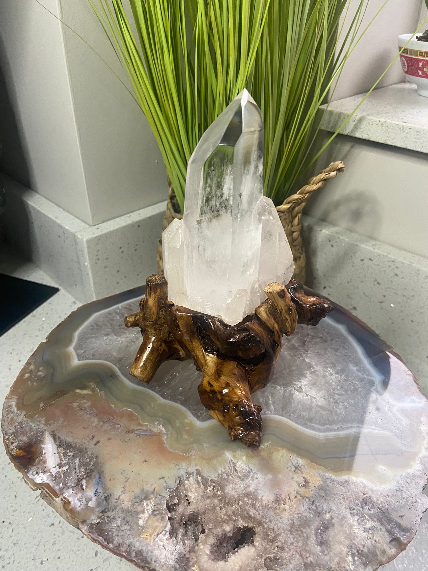 Clear Quartz on wooden stand
