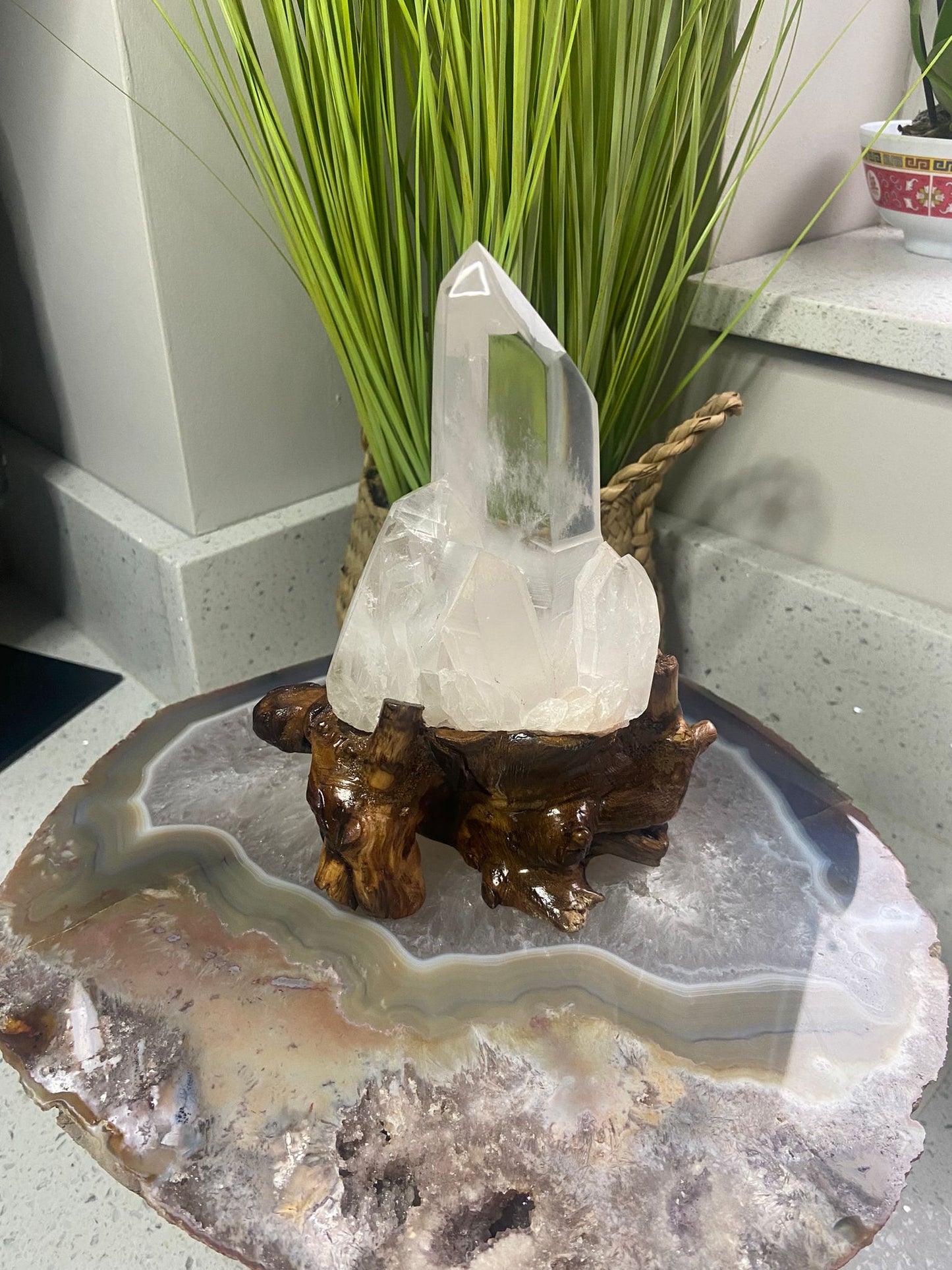 Clear Quartz on wooden stand