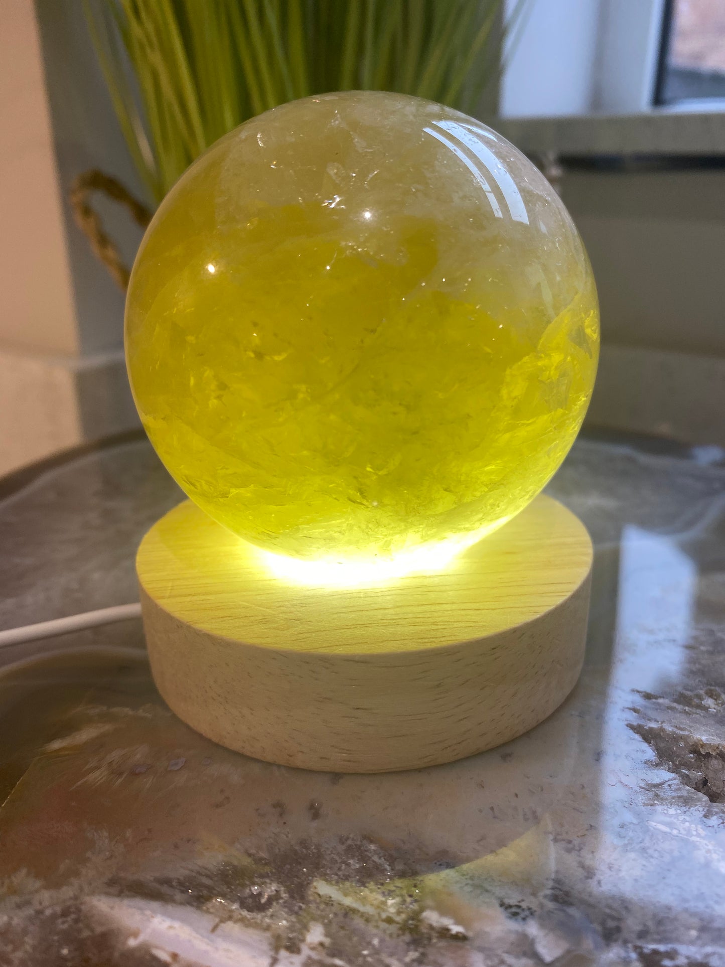 Citrine sphere on light up stand