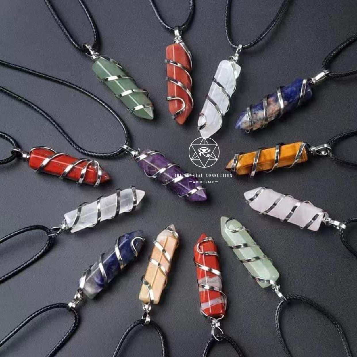 Crystal point pendants with rope